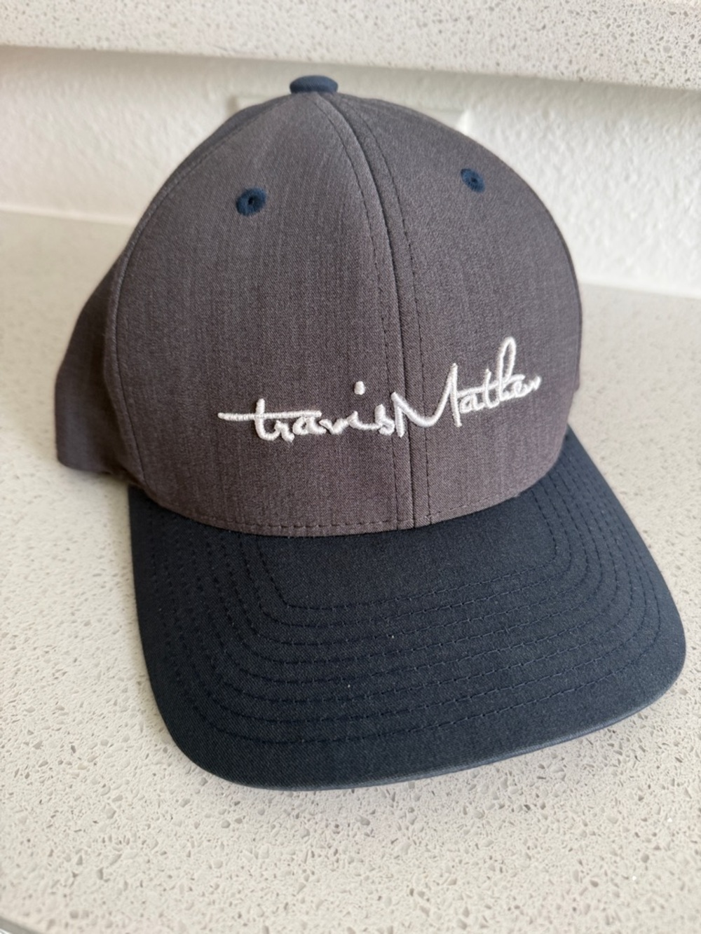 TravisMathew Script Logo Baseball Cap - Two-Tone Gray & Navy